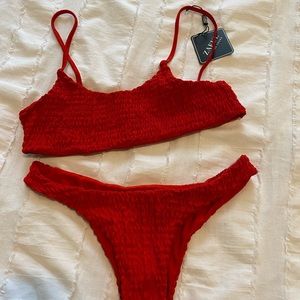 Never worn, cheeky suit!